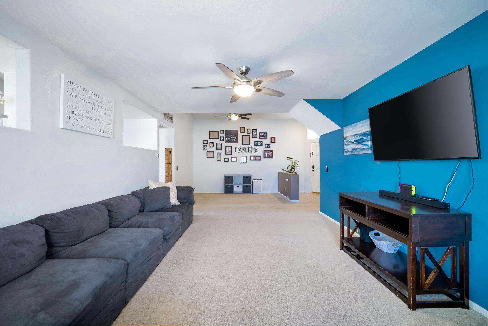 79350 Paseo Del Rey La Quinta, CA 92253 - Photo 7 of 41 a living room with furniture and a flat screen tv