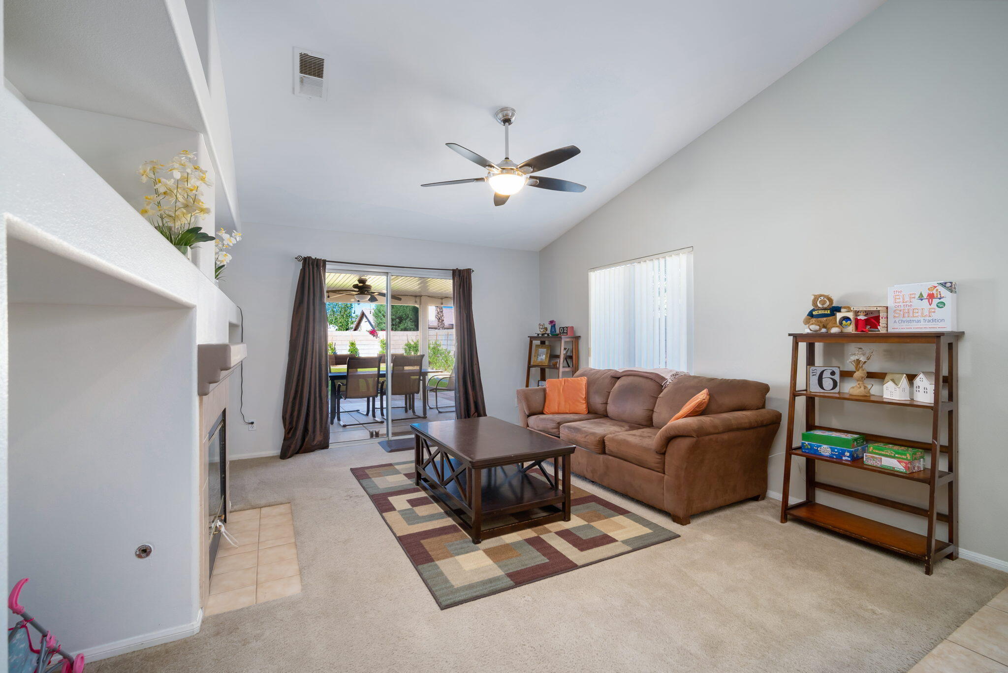 79350 Paseo Del Rey La Quinta, CA 92253 - Photo 10 of 41 a living room with furniture and a window