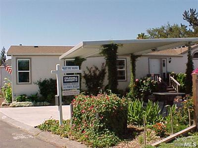 144 Bryce Canyon Road, Unit 99999 San Rafael, CA 94903 - Photo 1 of 7 a front view of a house with a yard