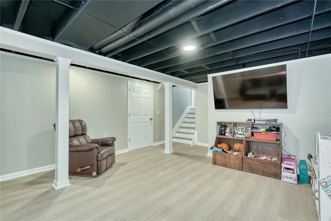 1038 Whalen Road Penfield, NY 14526 - Photo 32 of 46 Finished lower level basement space!
