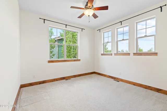 a view of a livingroom with storage and utility