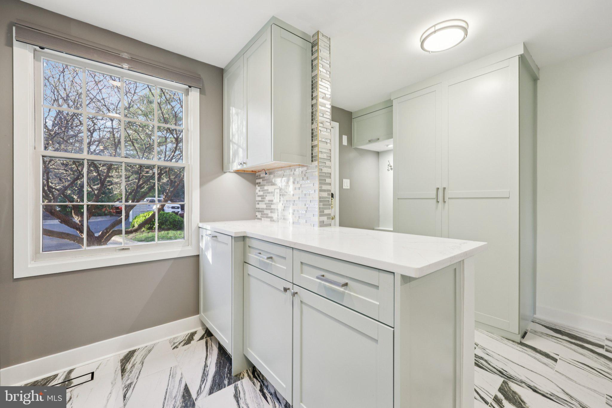 1666 Harvest Green Court Reston, VA 20194 - Photo 11 of 46 Mudroom in Foyer has custom closet with Pullouts