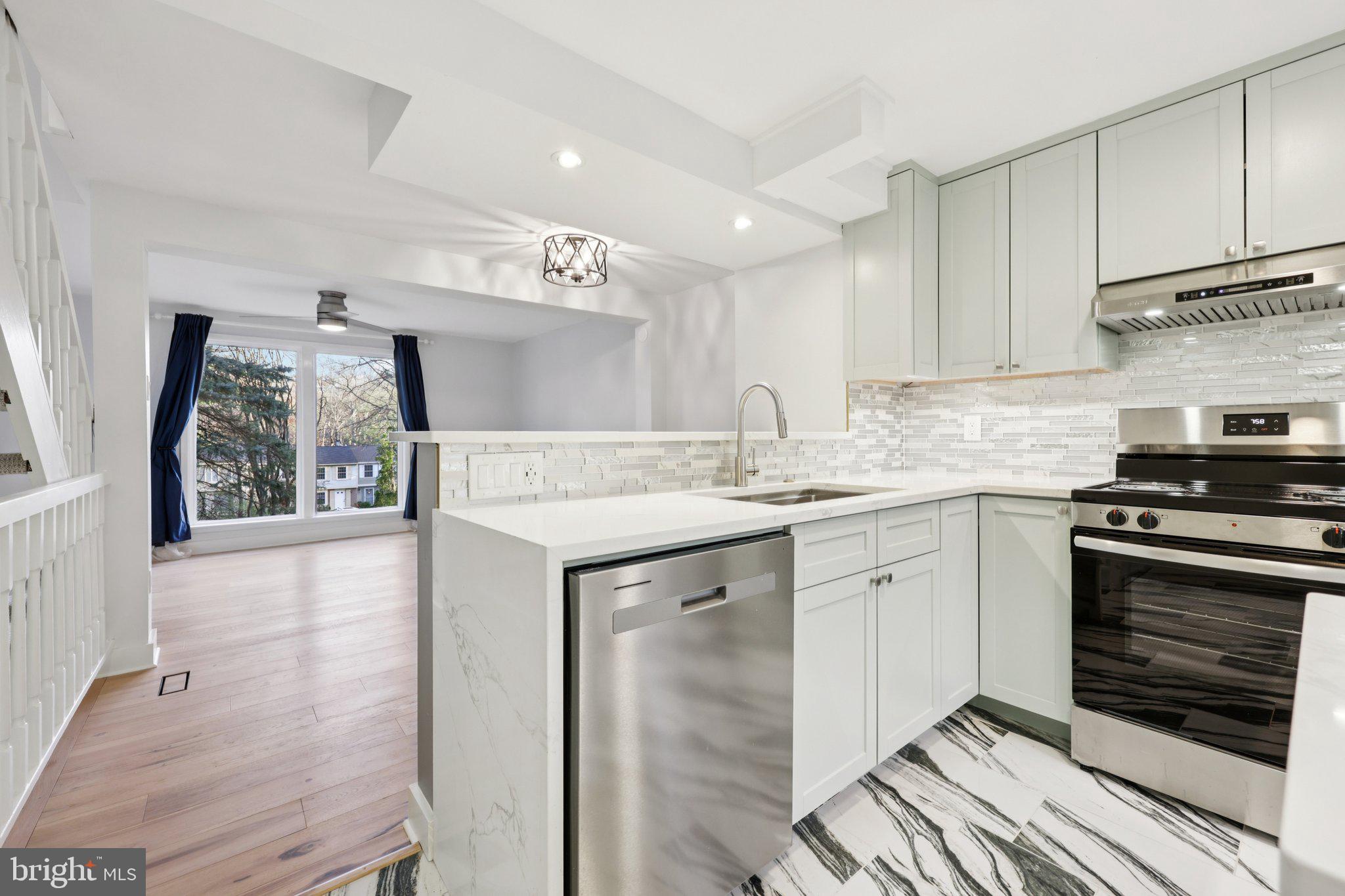 1666 Harvest Green Court Reston, VA 20194 - Photo 12 of 46 Kitchen overlooks dining room and Living Room