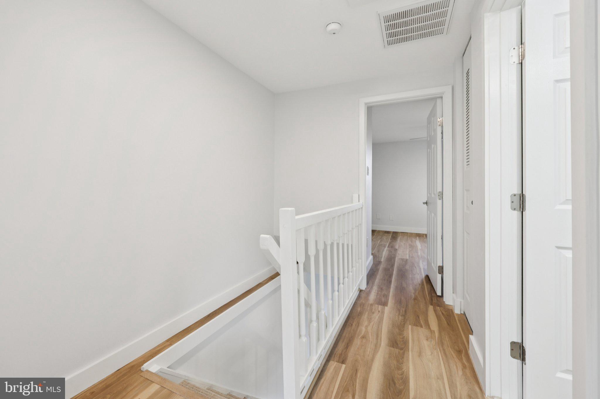 1666 Harvest Green Court Reston, VA 20194 - Photo 17 of 46 Hickory Engineered Hardwood floors Upstairs