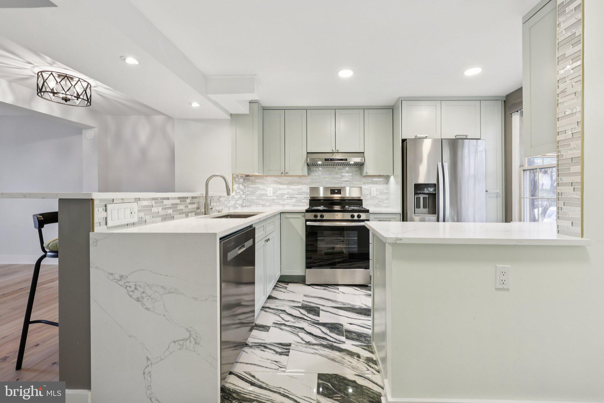 1666 Harvest Green Court Reston, VA 20194 - Photo 2 of 46 Custom Kitchen with Porcelain Floor Tile