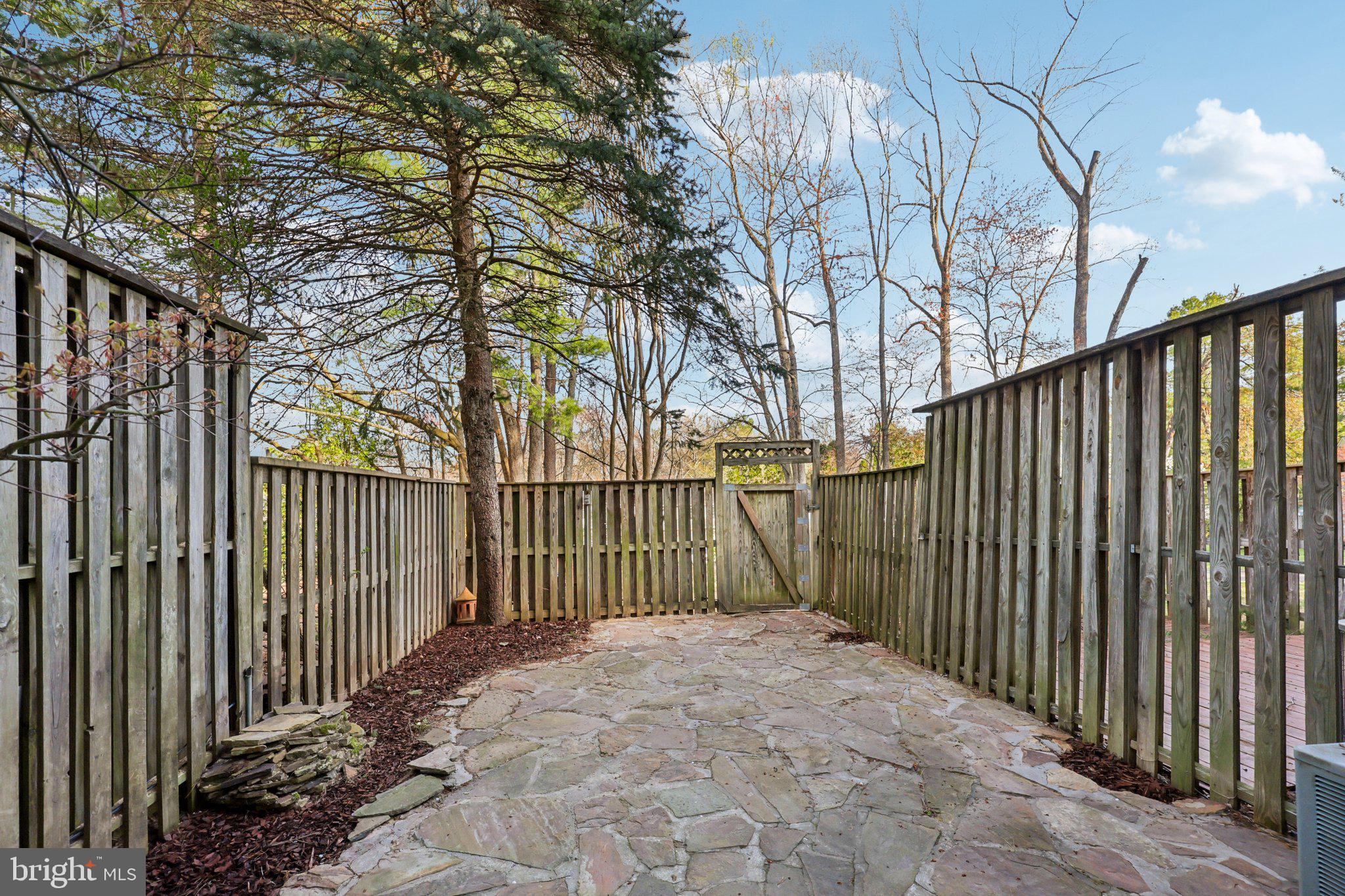 1666 Harvest Green Court Reston, VA 20194 - Photo 38 of 46 the home overlooks trees for privacy