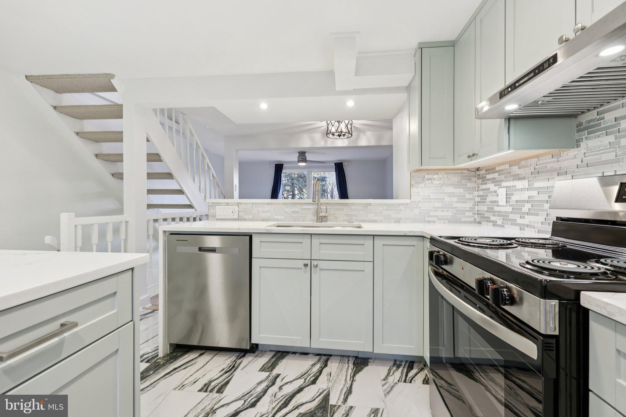 1666 Harvest Green Court Reston, VA 20194 - Photo 6 of 46 Kitchen looks out to Dining and Living Areas