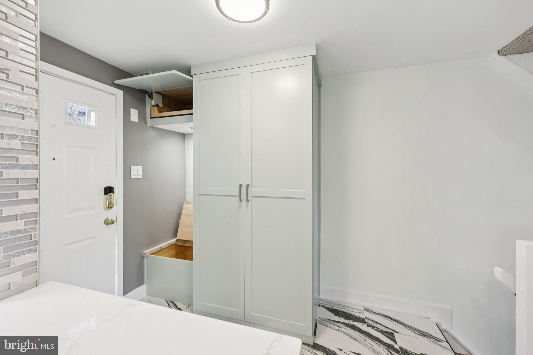 1666 Harvest Green Court Reston, VA 20194 - Photo 10 of 46 Mudroom area has custom bench w built in storage