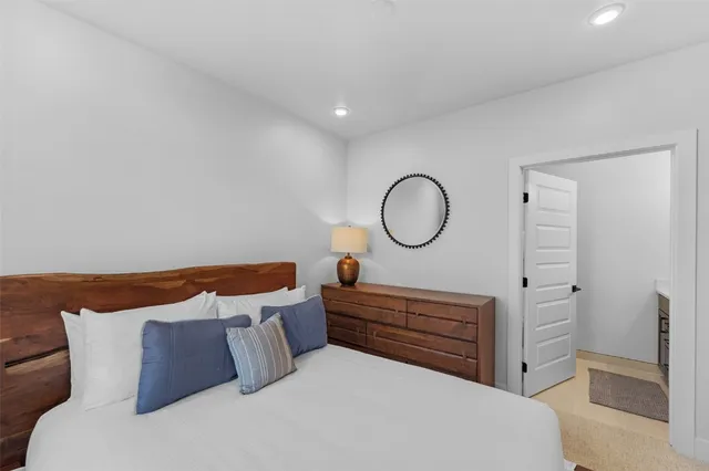 a room with furniture and a mirror