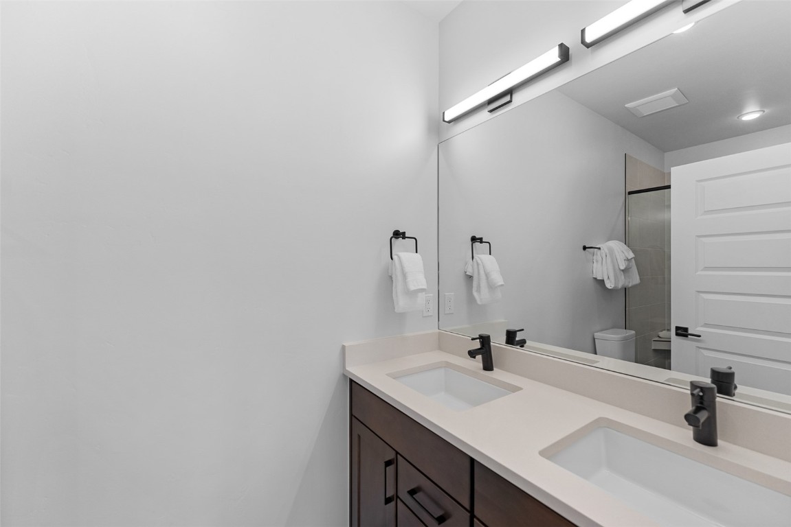 125 West Keystone Road, Unit 105 Keystone, CO 80435 - Photo 21 of 32 a bathroom with a sink and a mirror