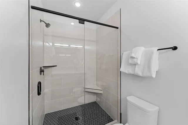 a view of a balcony with furniture