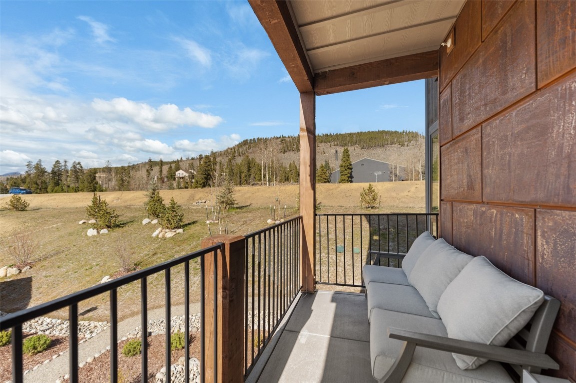 125 West Keystone Road, Unit 105 Keystone, CO 80435 - Photo 23 of 32 a view of a balcony with furniture