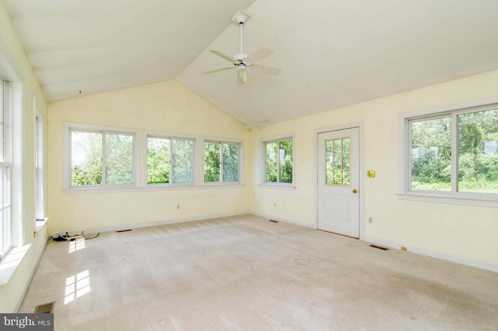 17615 Falls Road Upperco, MD 21155 - Photo 13 of 26 an empty room with windows
