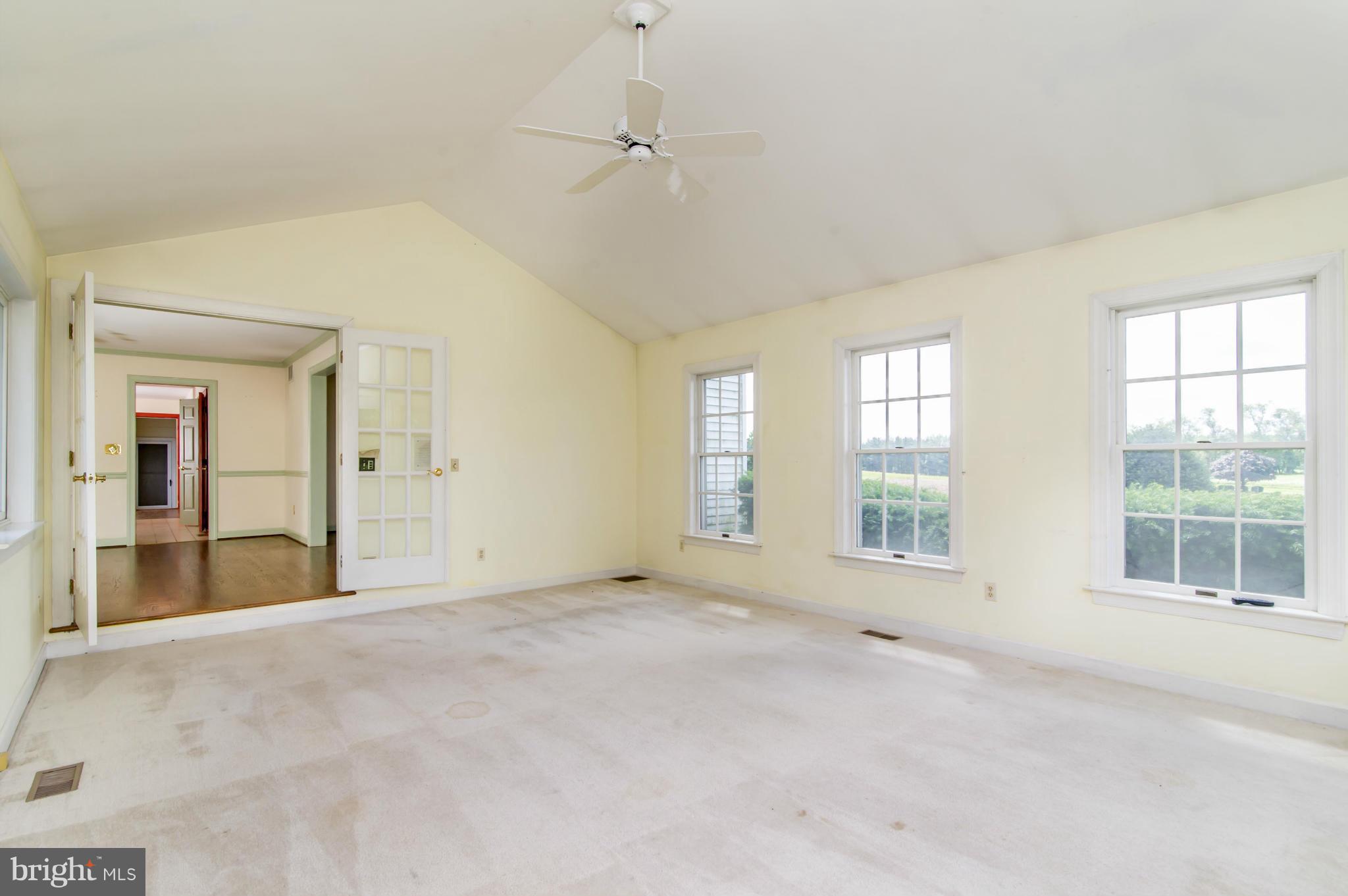 17615 Falls Road Upperco, MD 21155 - Photo 14 of 26 a view of an empty room with a window