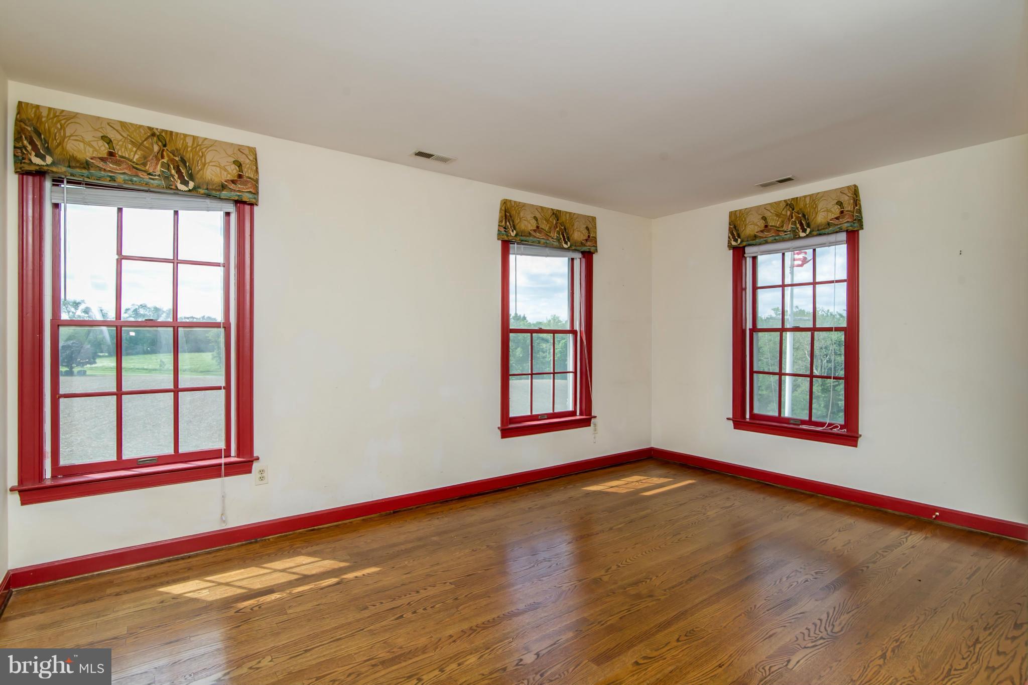 17615 Falls Road Upperco, MD 21155 - Photo 18 of 26 a view of an empty room with window