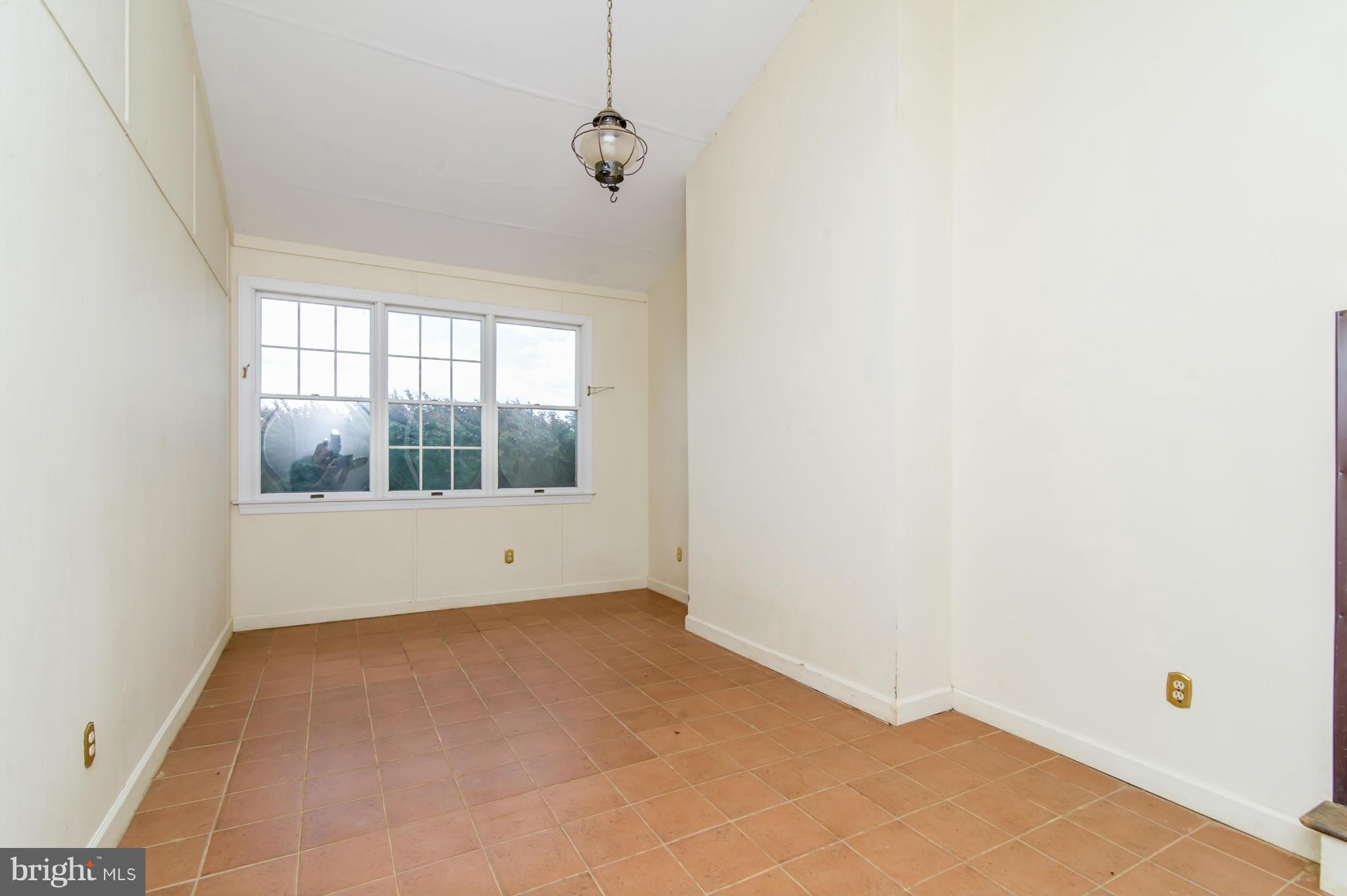 17615 Falls Road Upperco, MD 21155 - Photo 10 of 26 a view of an empty room with a window
