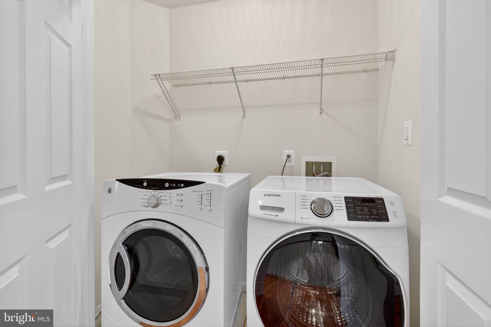 9144 Furey Road Lorton, VA 22079 - Photo 17 of 28 a utility room with dryer and washer