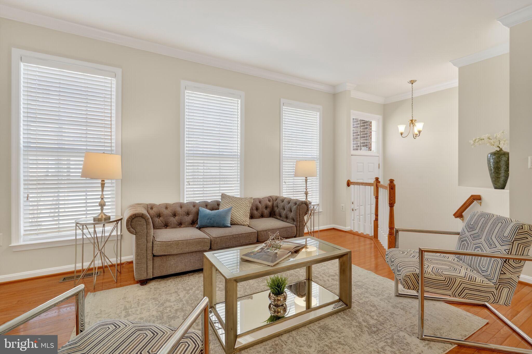 9144 Furey Road Lorton, VA 22079 - Photo 2 of 28 a living room with furniture and a window