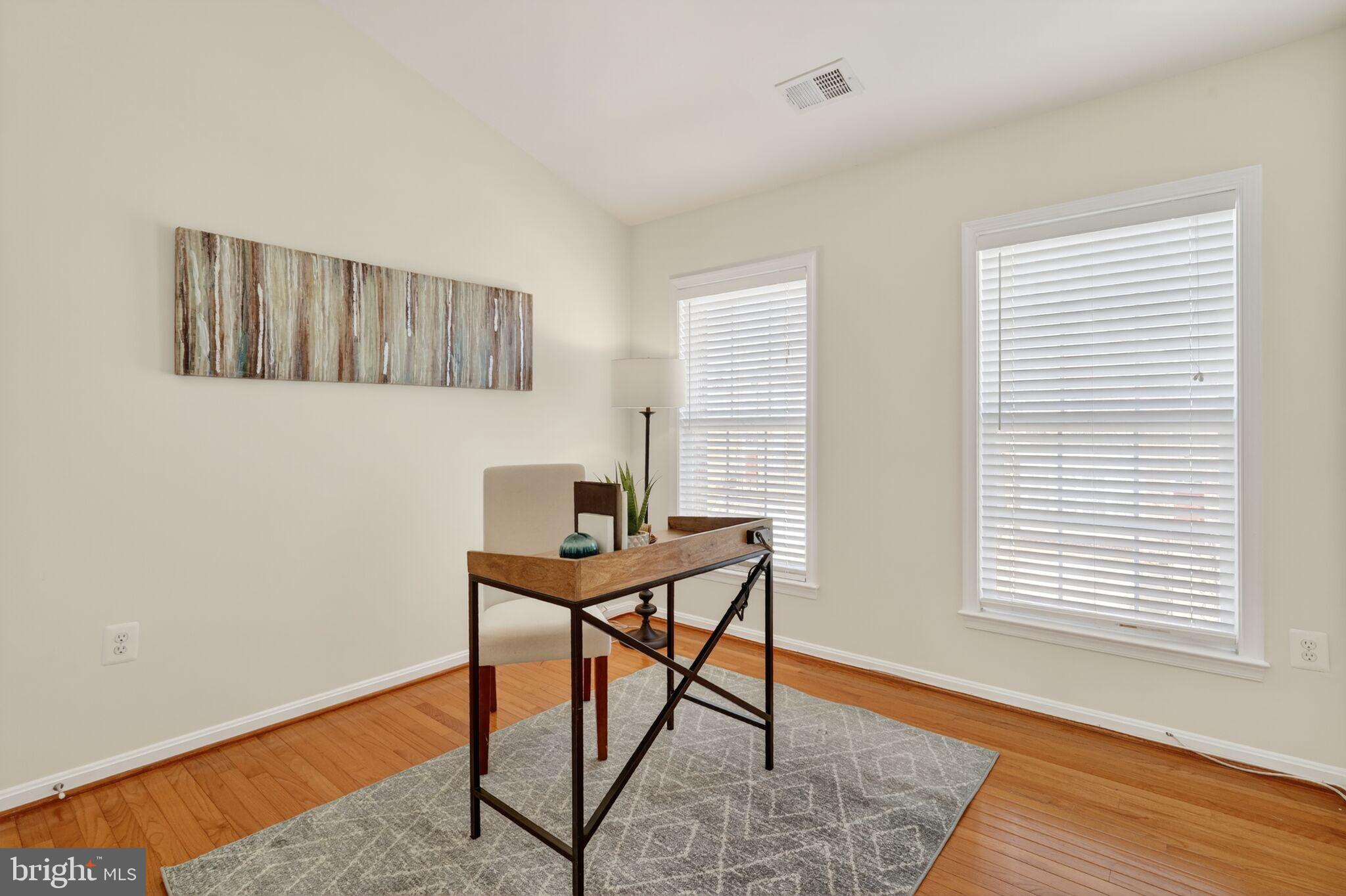 9144 Furey Road Lorton, VA 22079 - Photo 21 of 28 a workspace with furniture and wooden floor