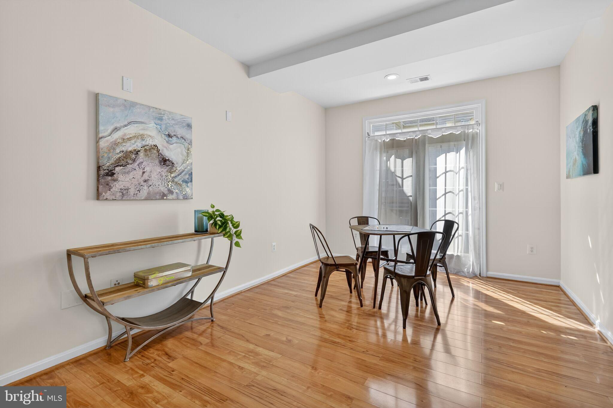 9144 Furey Road Lorton, VA 22079 - Photo 25 of 28 a dining room with furniture and wooden floor