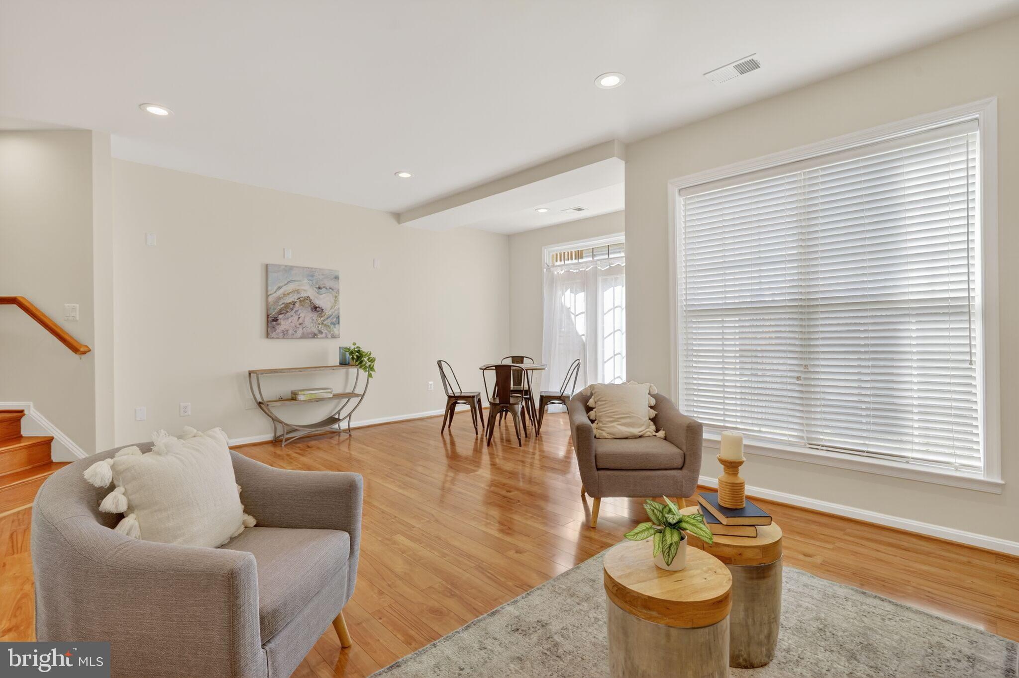 9144 Furey Road Lorton, VA 22079 - Photo 26 of 28 a living room with furniture and a large window
