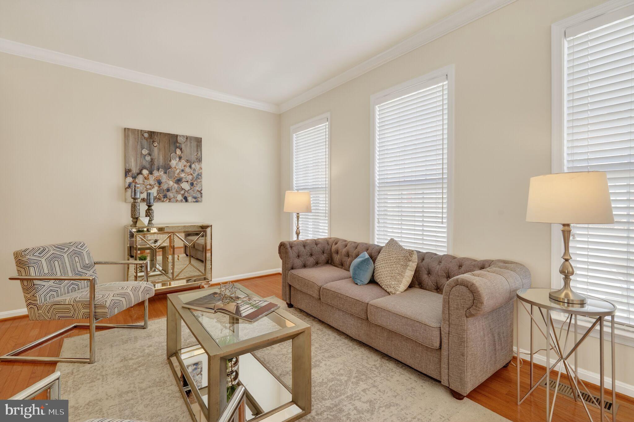 9144 Furey Road Lorton, VA 22079 - Photo 3 of 28 a living room with furniture and a window