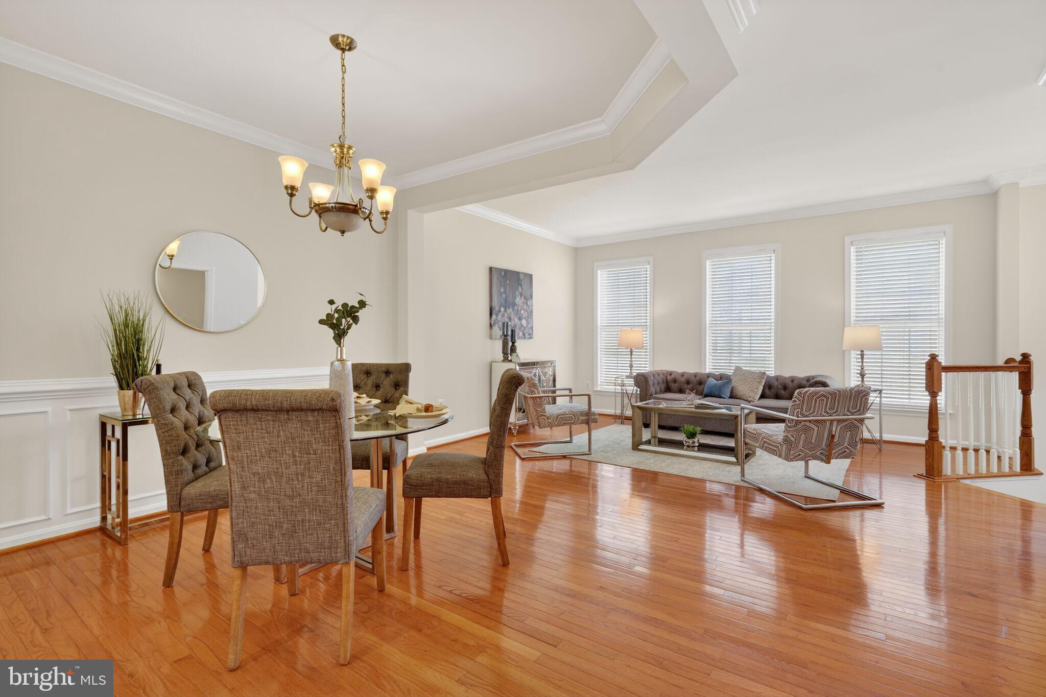 9144 Furey Road Lorton, VA 22079 - Photo 6 of 28 a living room with furniture kitchen view and a dining table