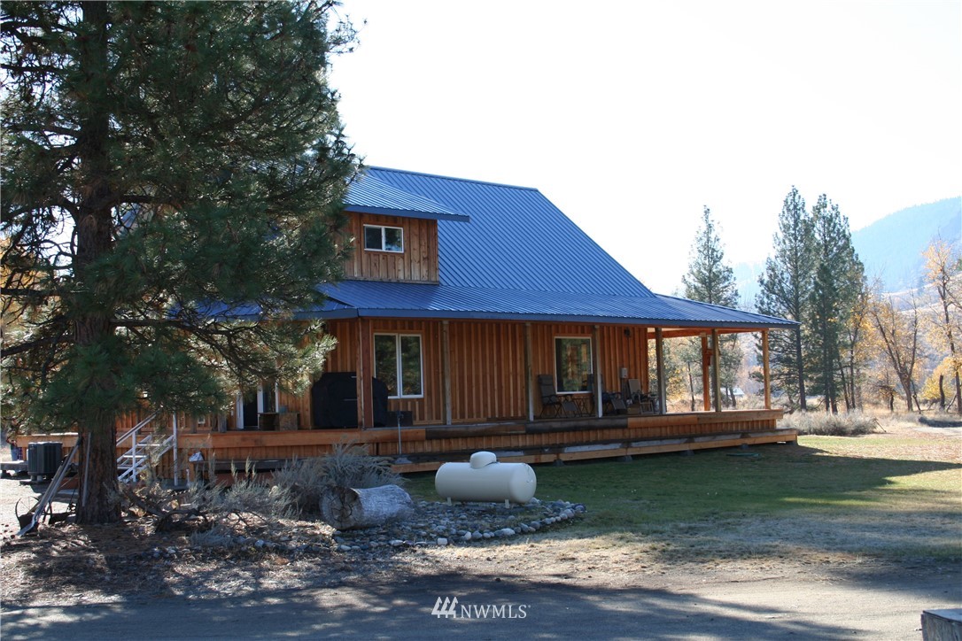 46 Beaver Pond Road Twisp, WA 98856 - Photo 12 of 31 a front view of a house with garden
