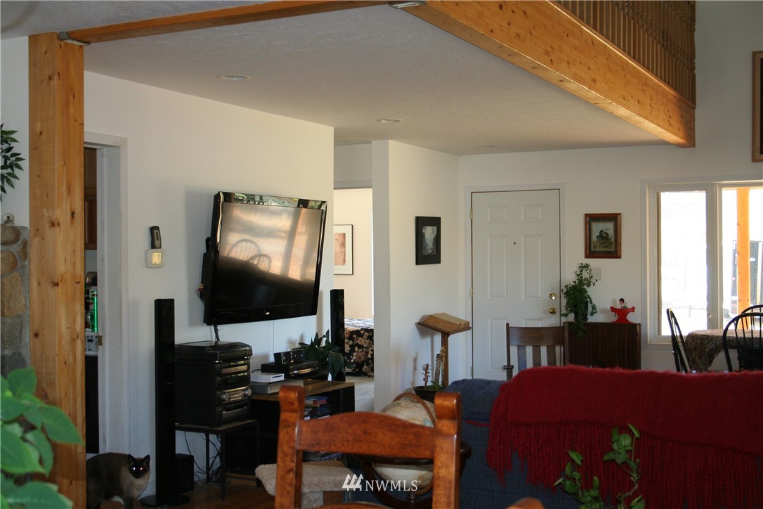 46 Beaver Pond Road Twisp, WA 98856 - Photo 14 of 31 a living room with furniture and a flat screen tv