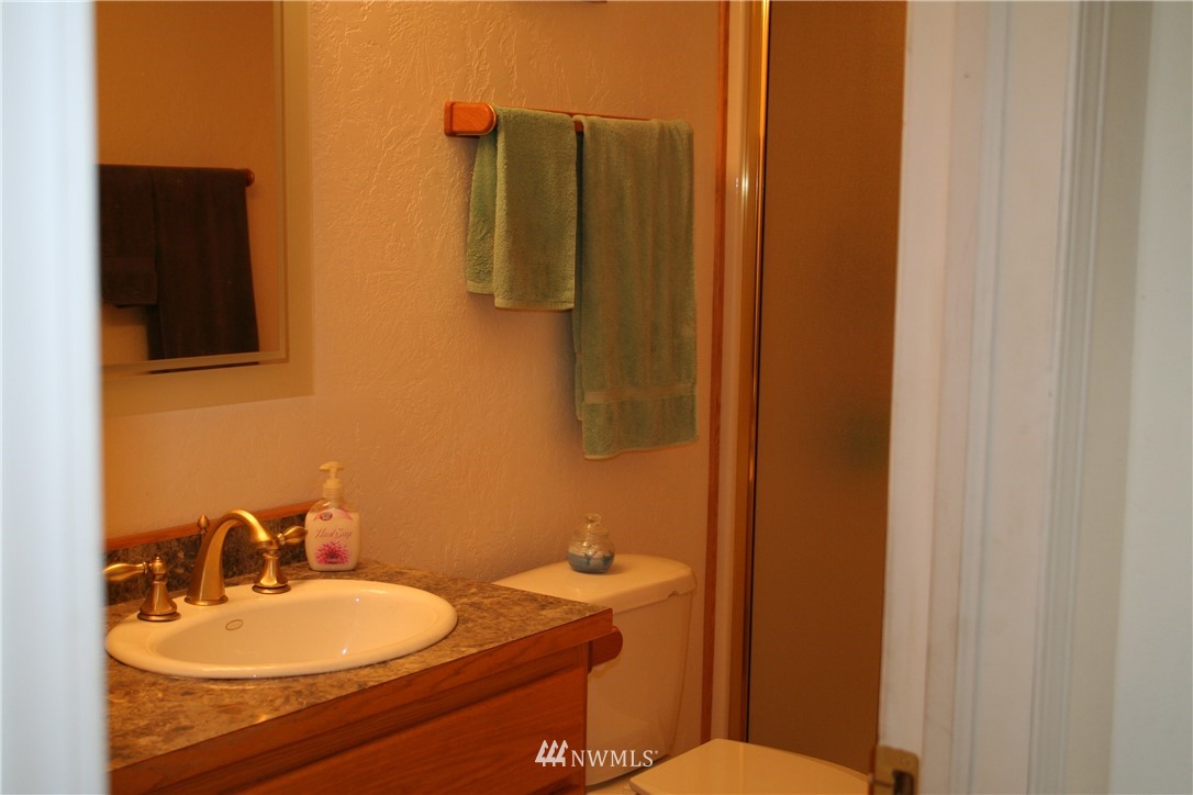 46 Beaver Pond Road Twisp, WA 98856 - Photo 21 of 31 a bathroom with a sink and a mirror