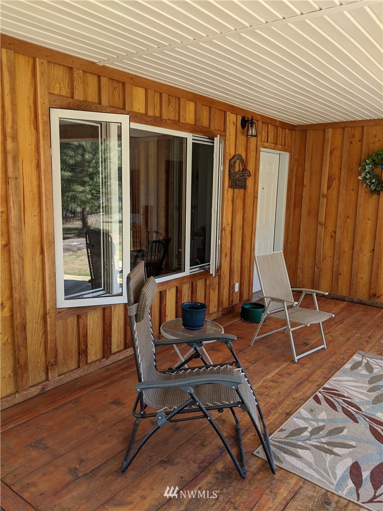 46 Beaver Pond Road Twisp, WA 98856 - Photo 26 of 31 a view of a two chairs in front of a house