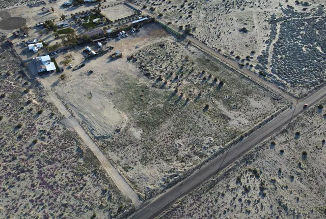 a kitchen with stainless steel appliances granite countertop a sink and stove top oven