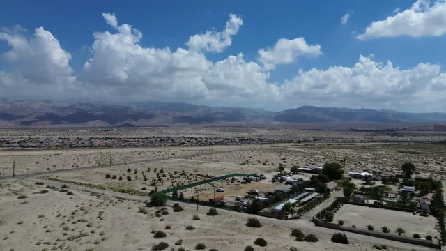 a kitchen with a stove a sink and a refrigerator
