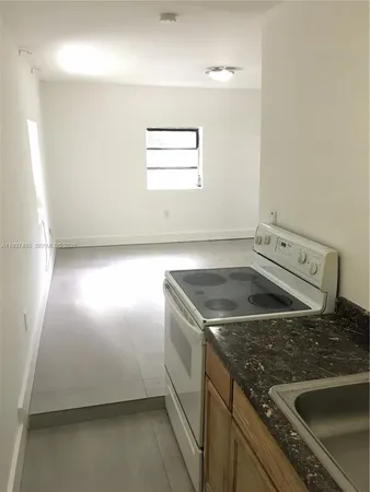 an empty room with window