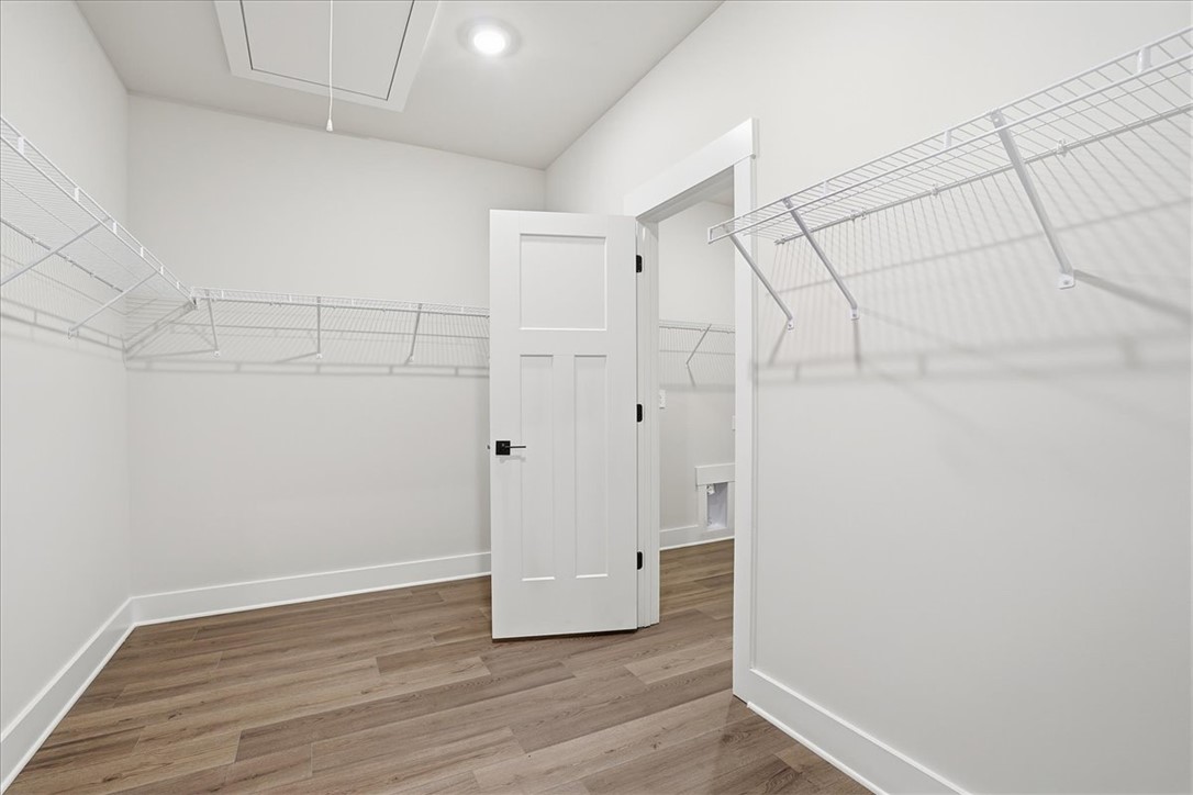343 Allingham Road Piedmont, SC 29673 - Photo 21 of 37 Ample wire shelving maximizes storage potential in this well-lit walk-in closet.