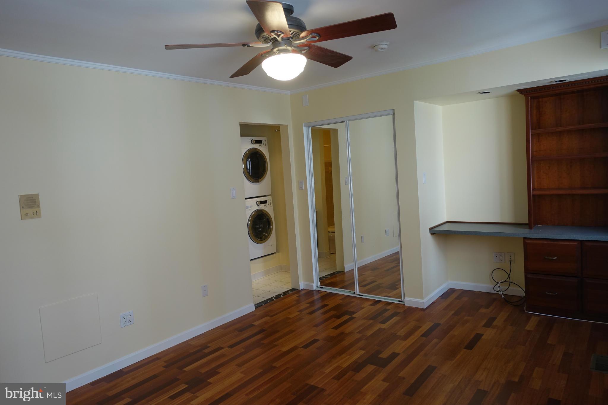 1526 12th Street Northwest, Unit 2 Washington, DC 20005 - Photo 11 of 15 a bedroom with a bed and a window
