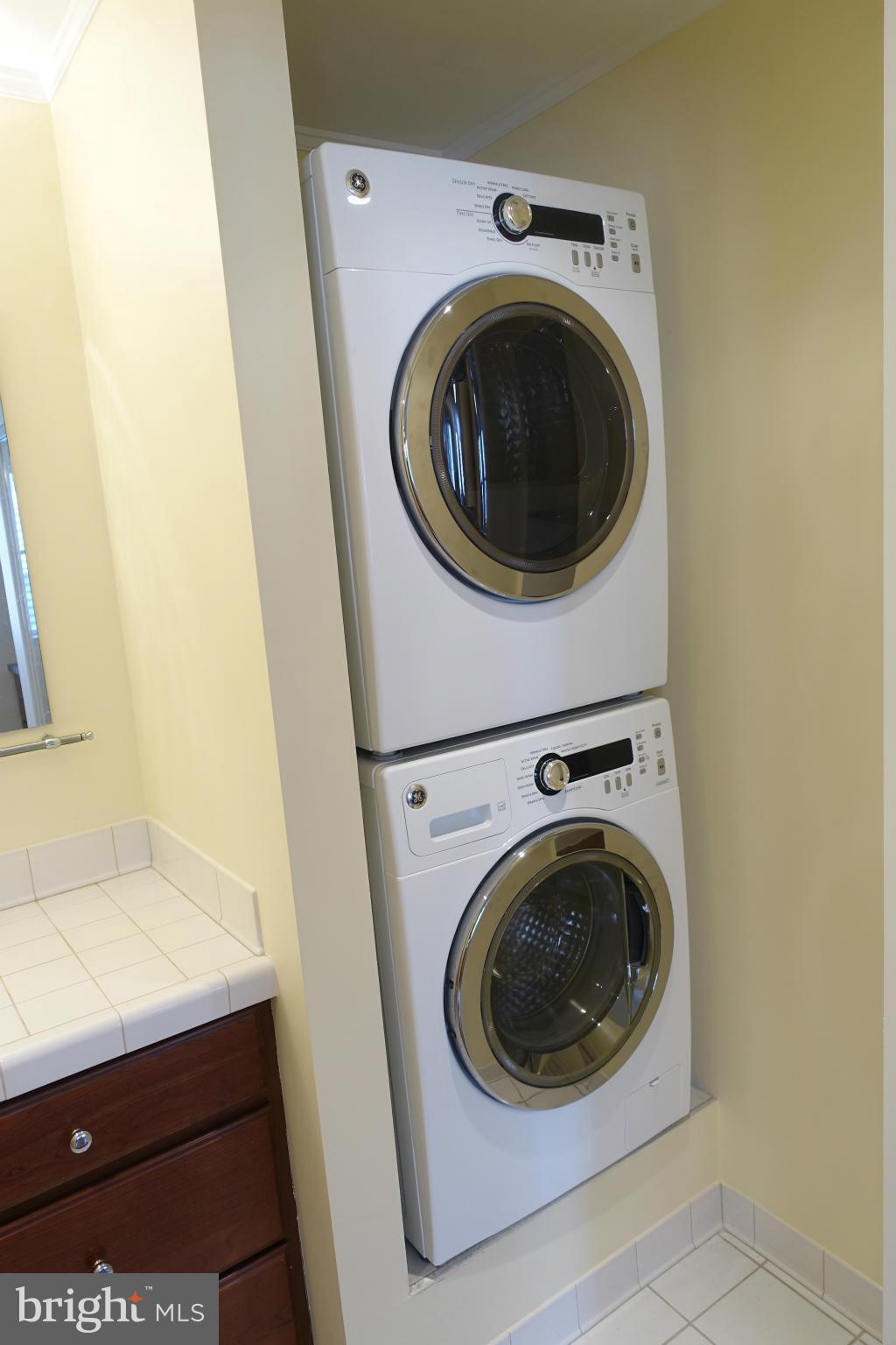 1526 12th Street Northwest, Unit 2 Washington, DC 20005 - Photo 13 of 15 a utility room with dryer and washer