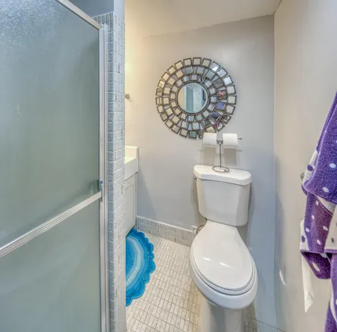 a bathroom with a toilet and a sink