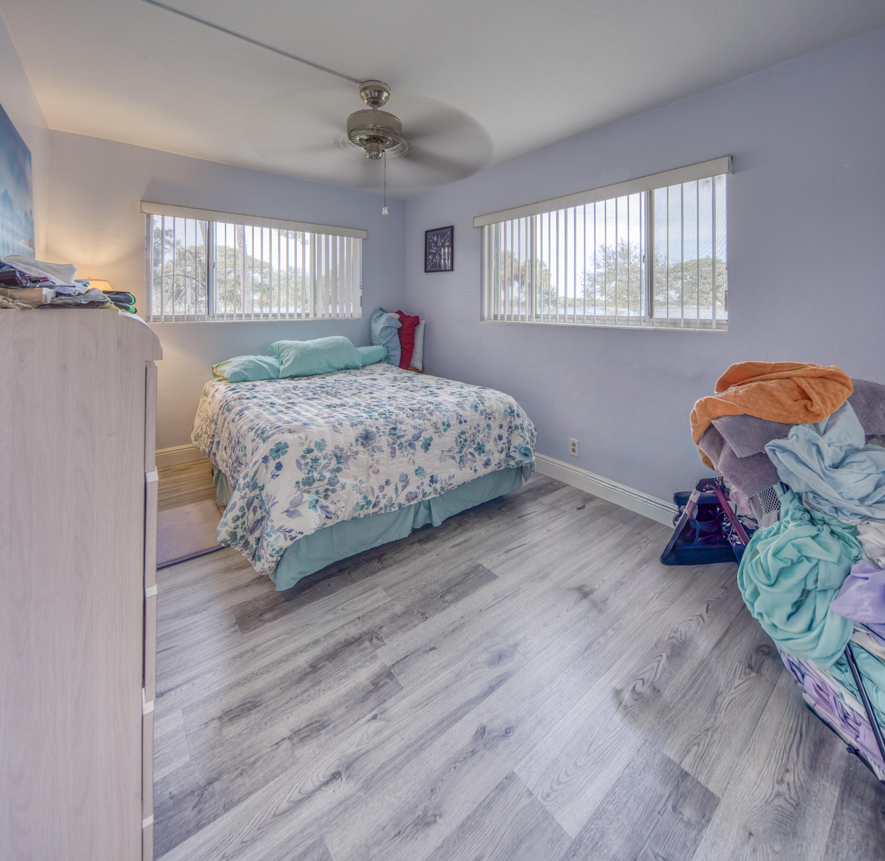 2004 Lake Osborne Drive, Unit 1 Lake Worth Beach, FL 33461 - Photo 9 of 30 a bedroom with a bed and a window