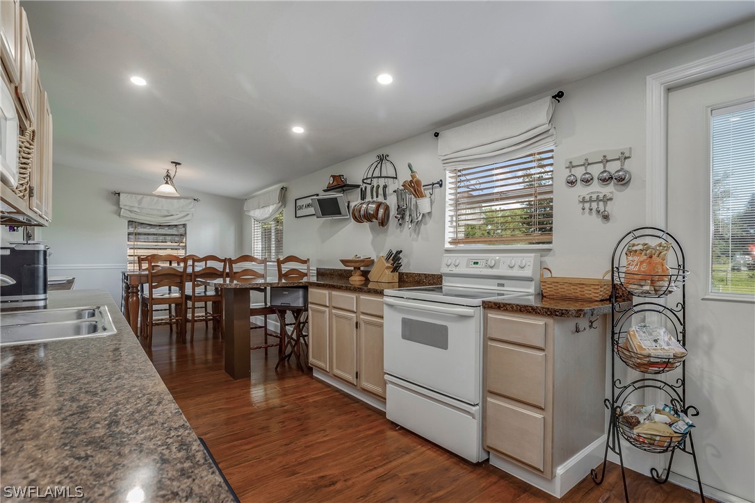 23751 North River Road Alva, FL 33920 - Photo 13 of 34 a kitchen with lots of counter top space