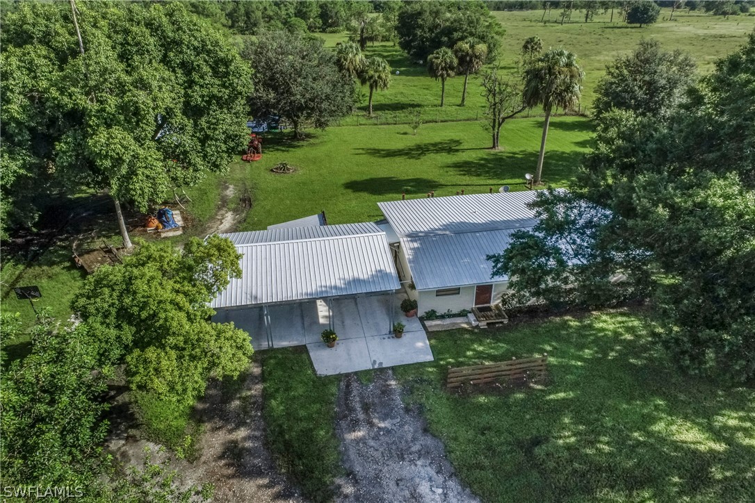 23751 North River Road Alva, FL 33920 - Photo 3 of 34 an aerial view of a house