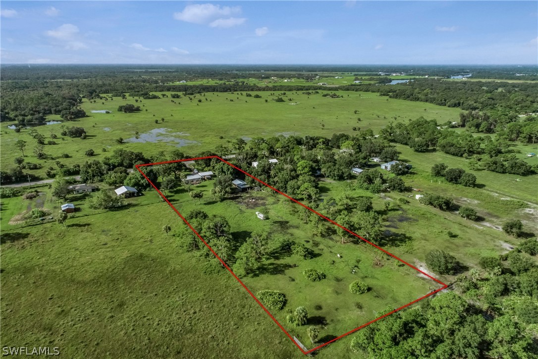 23751 North River Road Alva, FL 33920 - Photo 32 of 34 a view of a green field