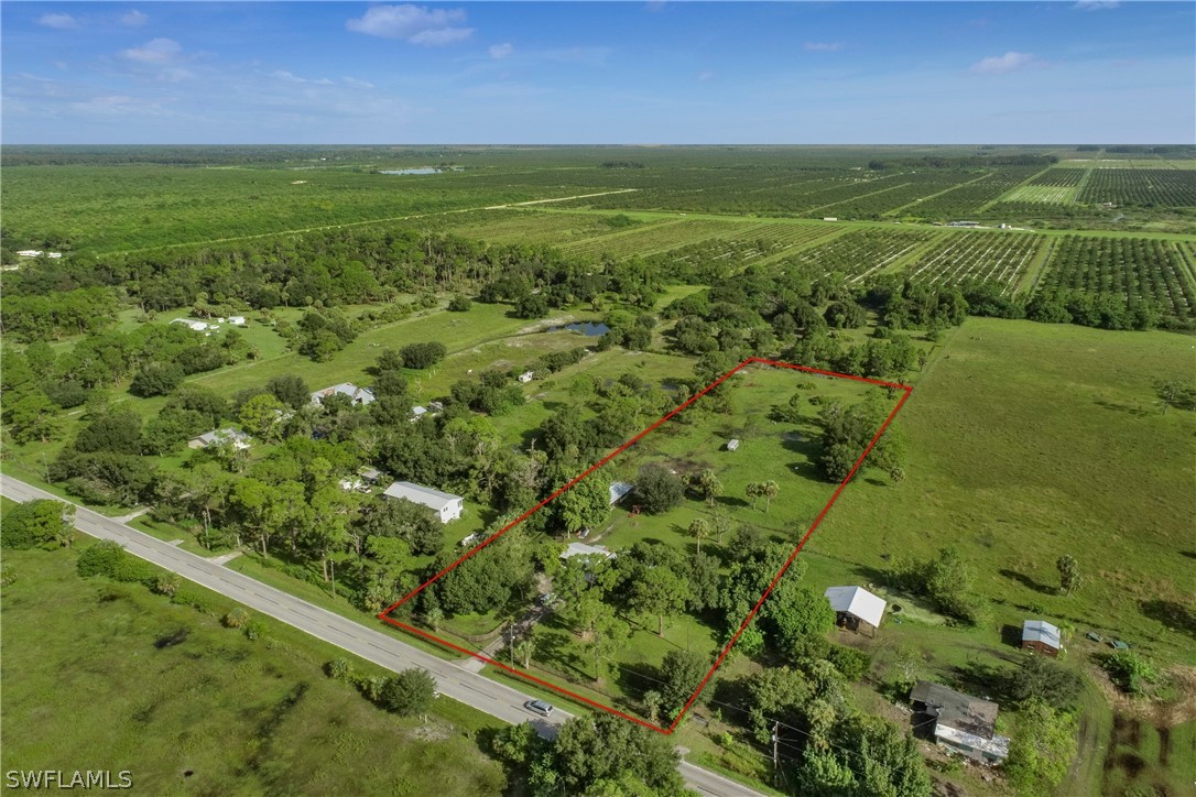 23751 North River Road Alva, FL 33920 - Photo 34 of 34 a view of a field with an ocean