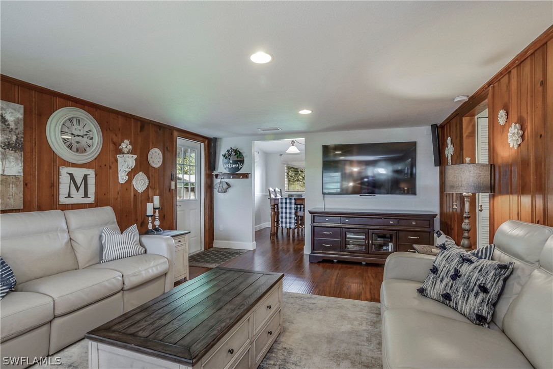 23751 North River Road Alva, FL 33920 - Photo 7 of 34 a living room with furniture and a flat screen tv