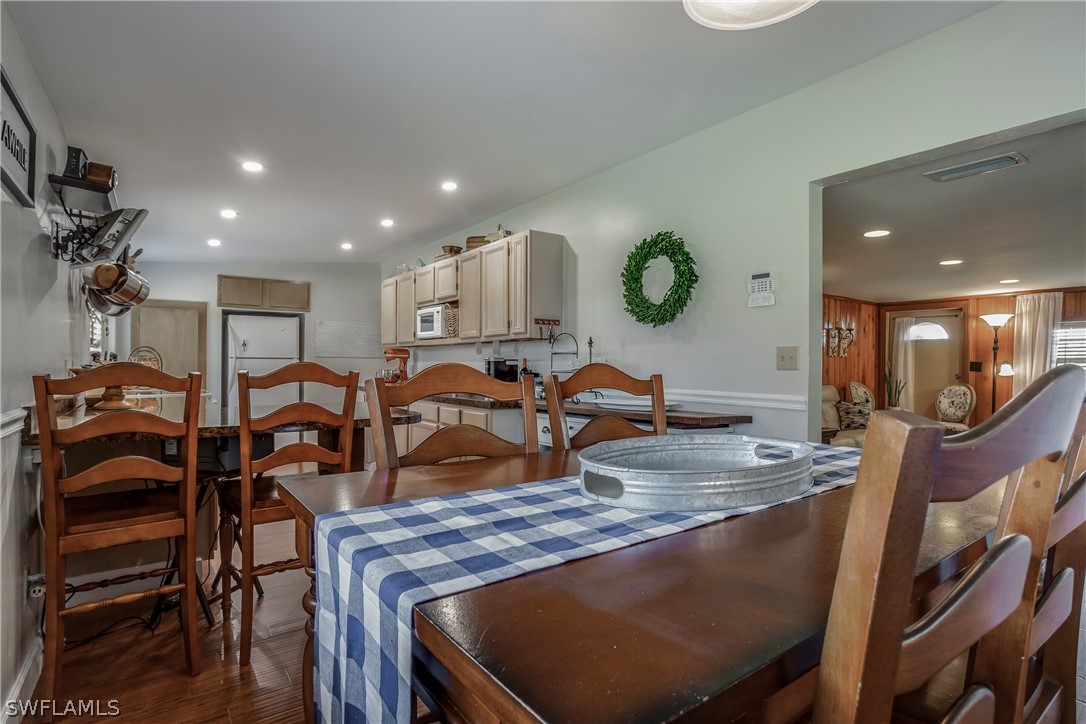 23751 North River Road Alva, FL 33920 - Photo 9 of 34 a view of a dining room with furniture