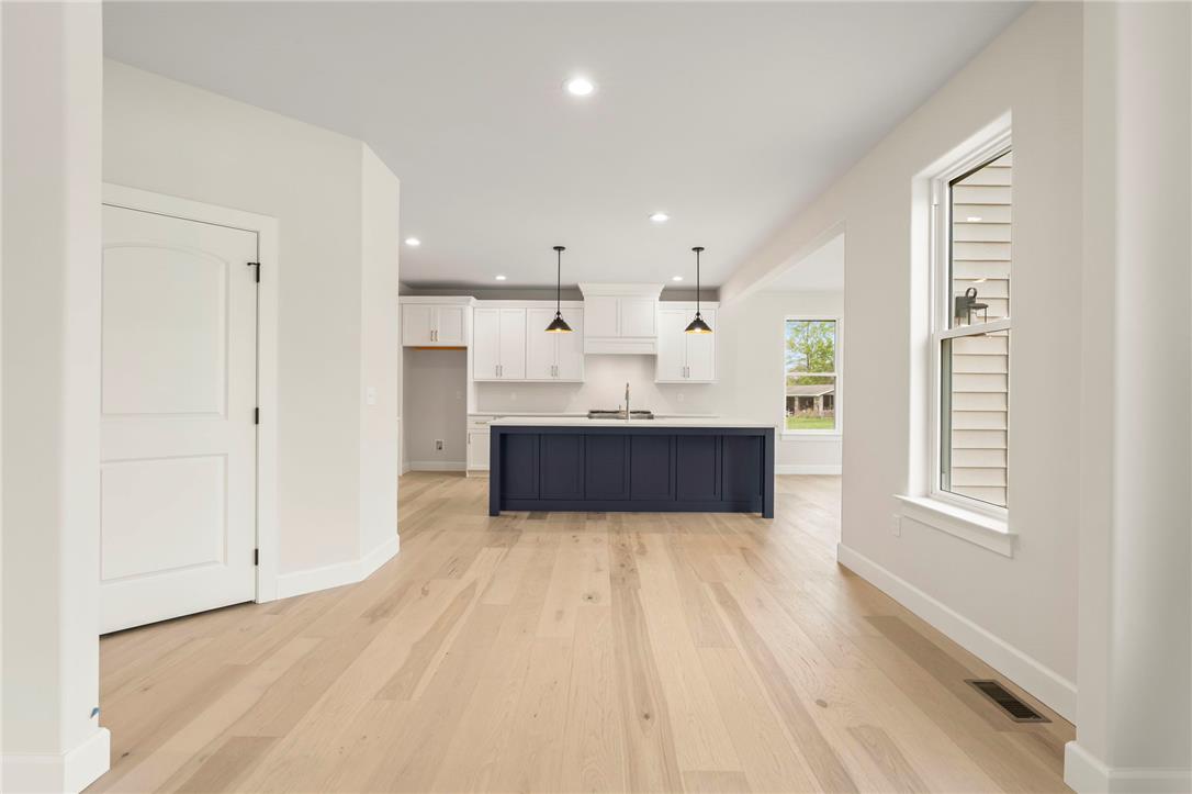Hottle Road Quakertown, PA 18951 - Photo 14 of 59 Gleaming hardwood floors and a spacious kitchen island anchor this open-concept layout.