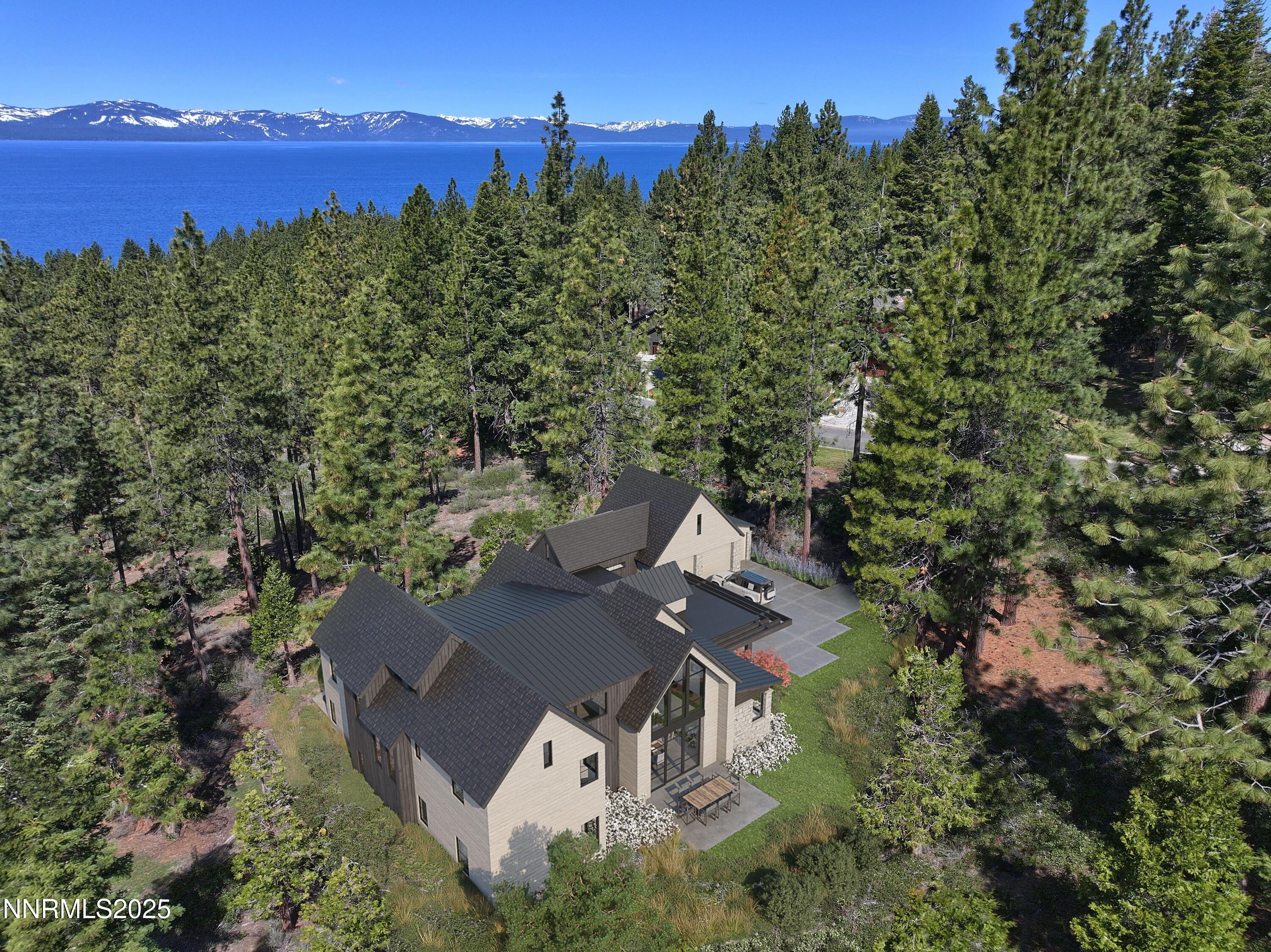 1227 Highway 50 Zephyr Cove, NV 89448 - Photo 3 of 16 an aerial view of a house with a yard