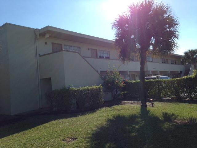 a view of a back yard of the house