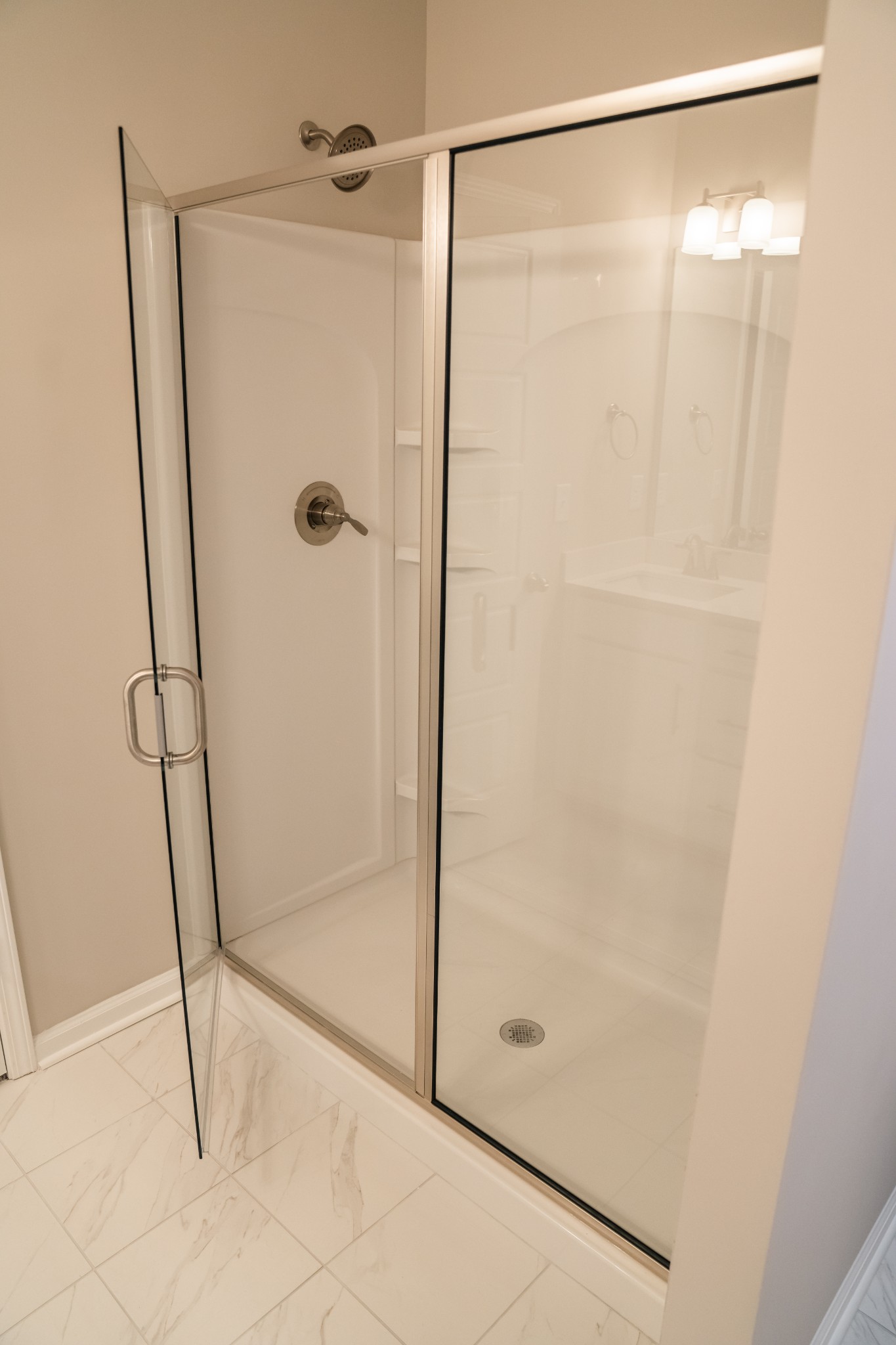 337 Carver Connection, Unit 33 Lebanon, TN 37087 - Photo 12 of 21 a bathroom with a glass shower door