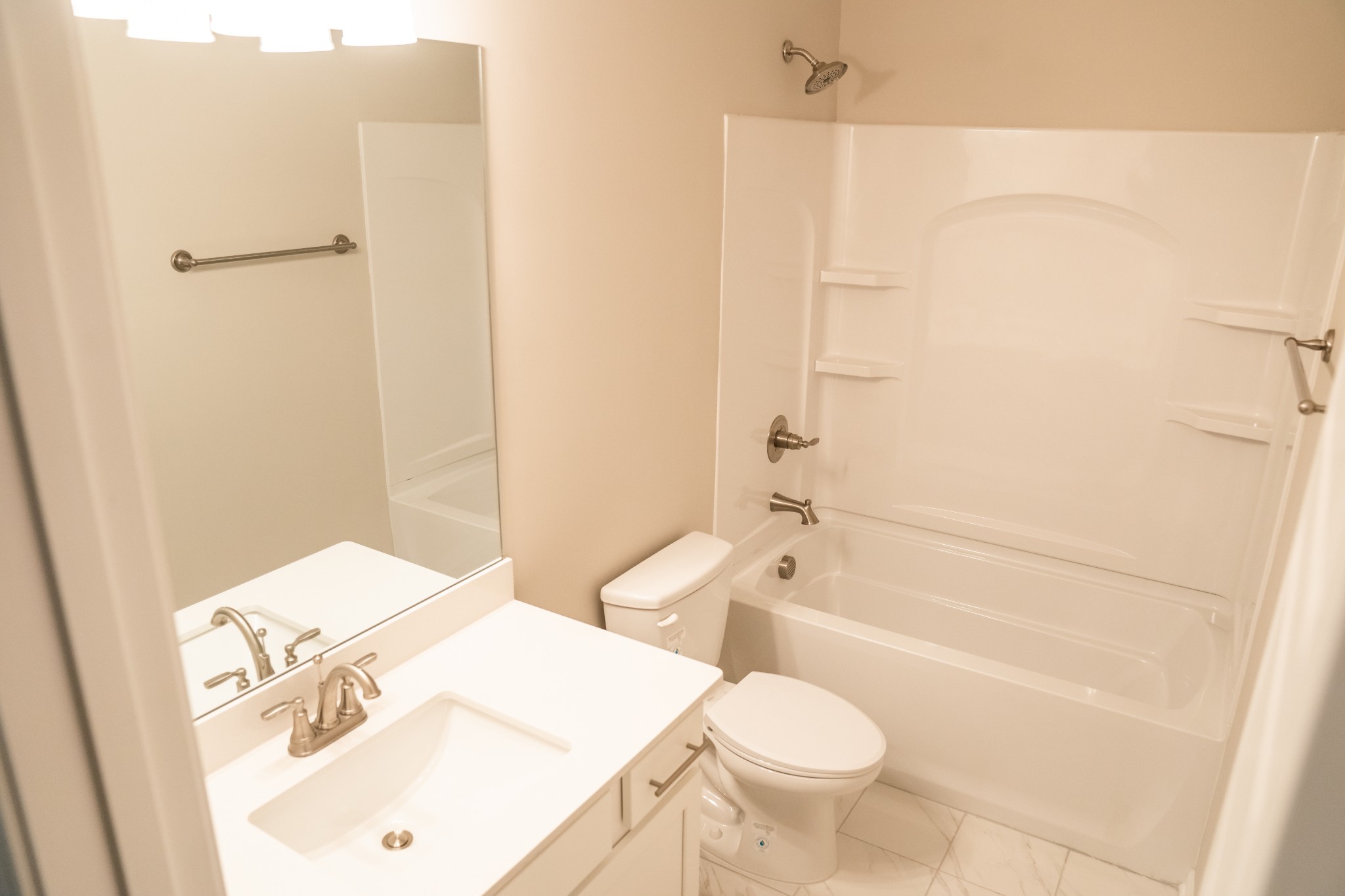 337 Carver Connection, Unit 33 Lebanon, TN 37087 - Photo 14 of 21 a bathroom with a sink a toilet and shower